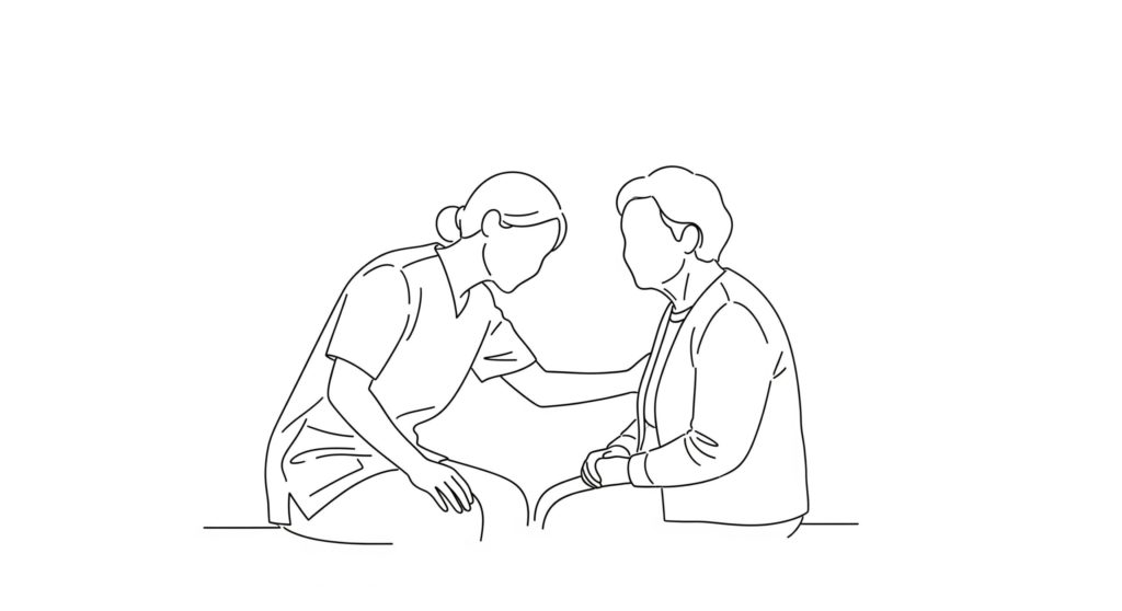 相手の話を聞く介護士